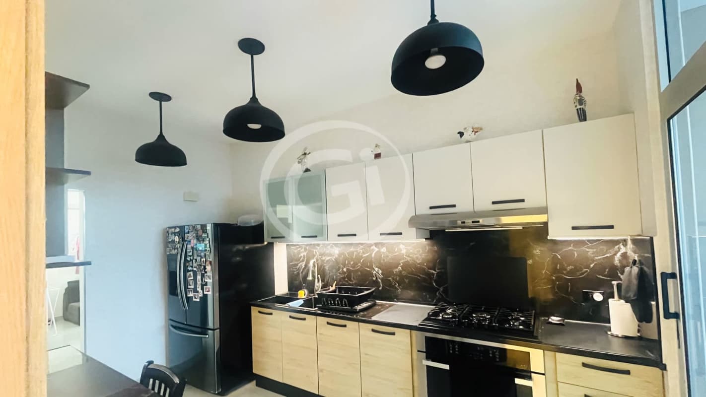 Balcony with outdoor seating and Panama City skyline at PH South Coast San Francisco