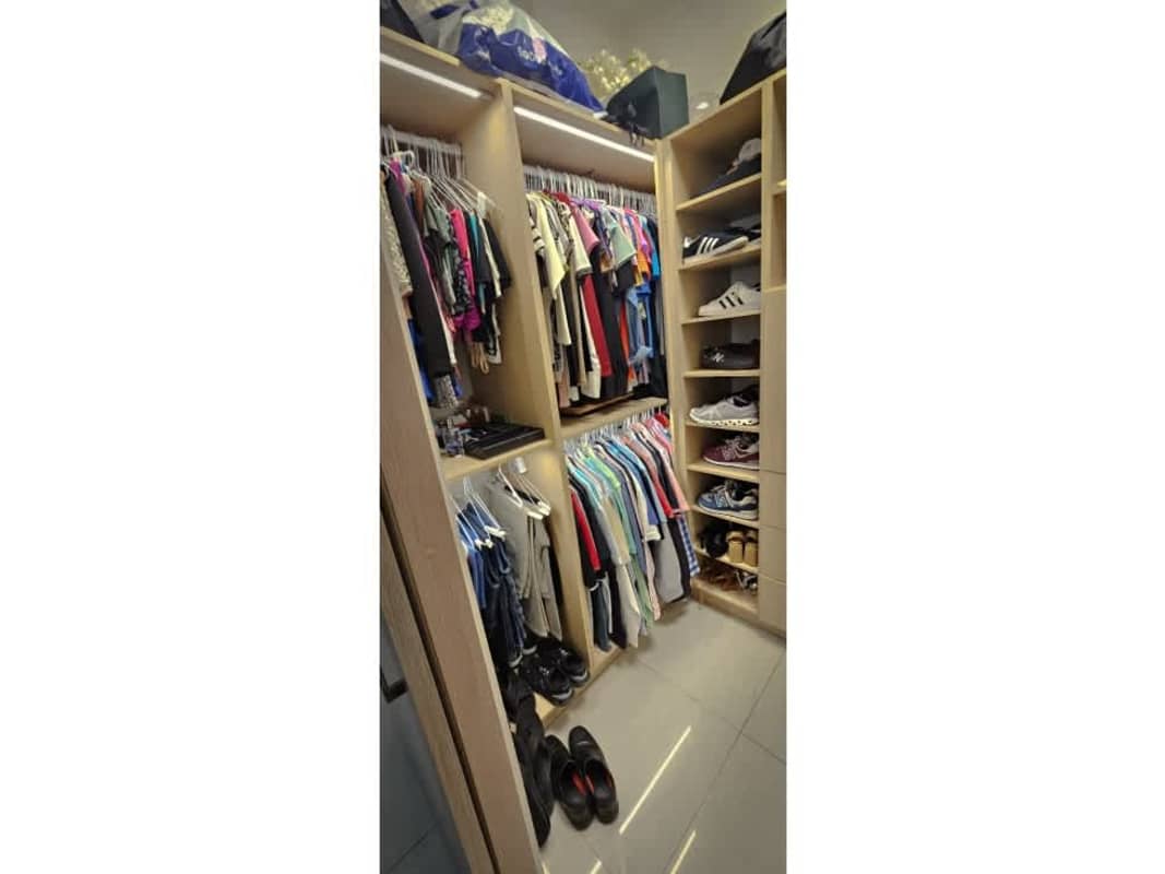 Dining area with elegant chandelier and modern furniture in PH South Coast San Francisco Panama