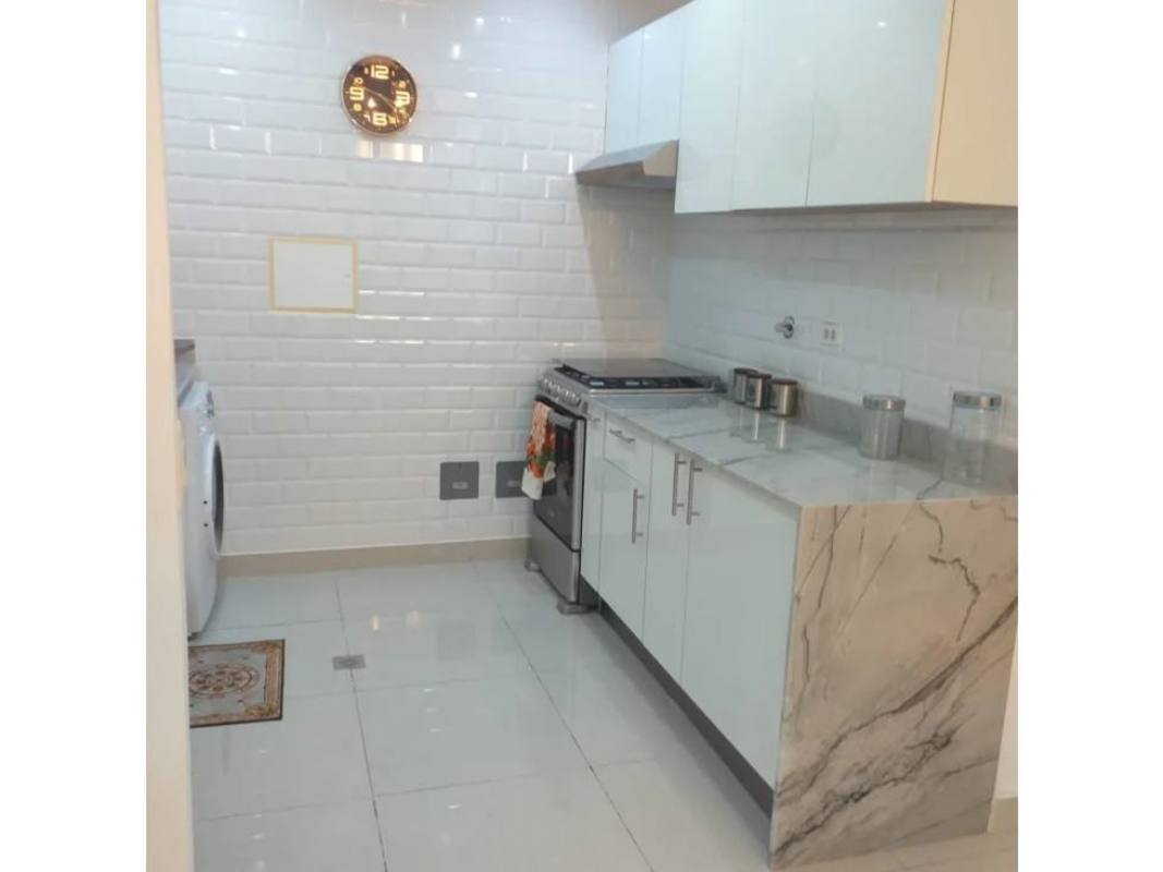 Compact modern kitchen with granite countertops PH Downtown Obarrio