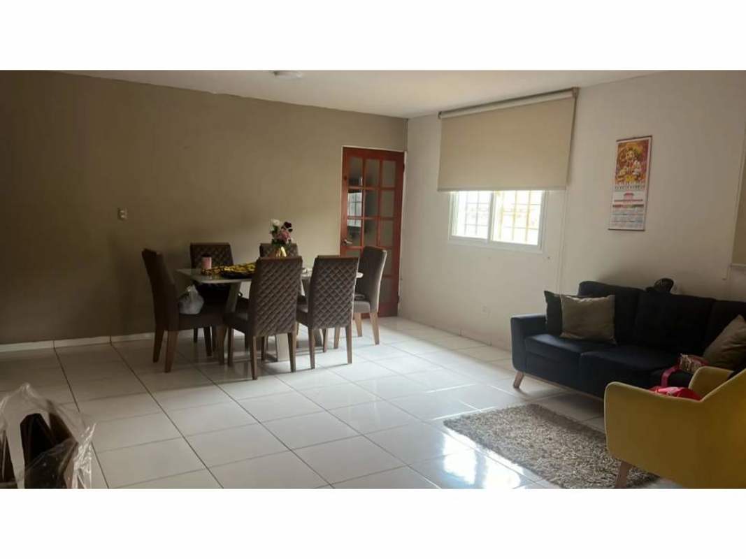 Spacious living dining area with neutral tones bright interior in El Crisol house