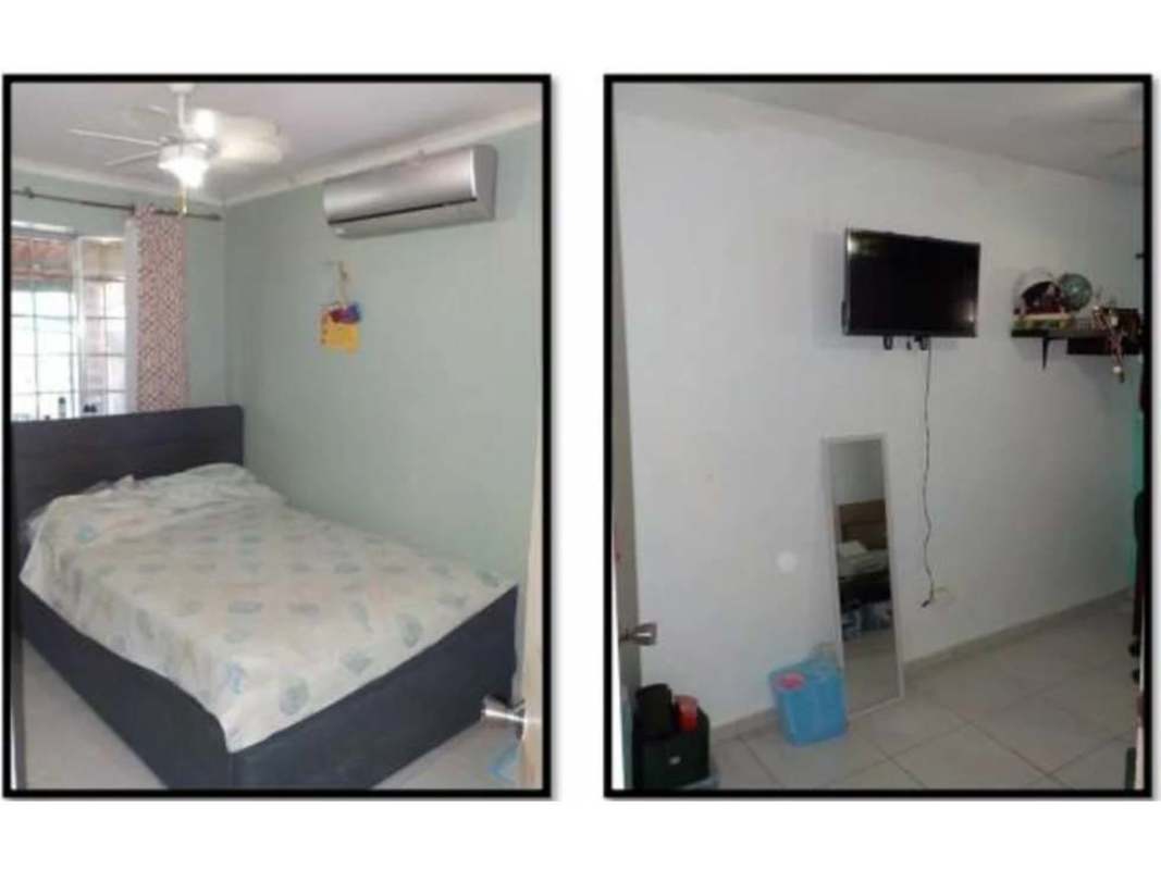 Bedroom with split air conditioning ceiling fan wall mounted TV in El Crisol house