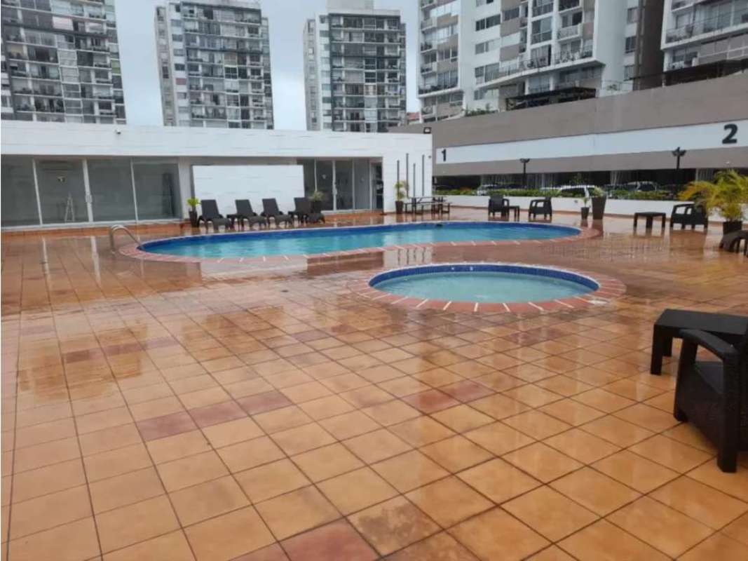 Condominium amenities with outdoor pool, jacuzzi, lounge area, and deck at PH Alsacia Tower Panama