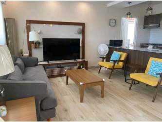 Covered patio overlooking pool and garden Villas del Maria Chame