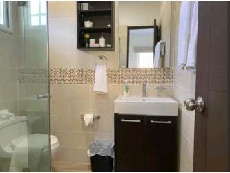 Contemporary bathroom with shower enclosure and vanity Villas del Maria Chame Panama