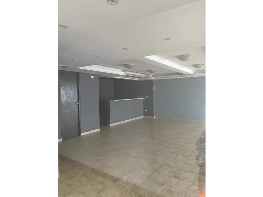 Living room with large windows, ceiling fan, tiled floors and balcony access in PH Cosmopolitan Tower Panama City