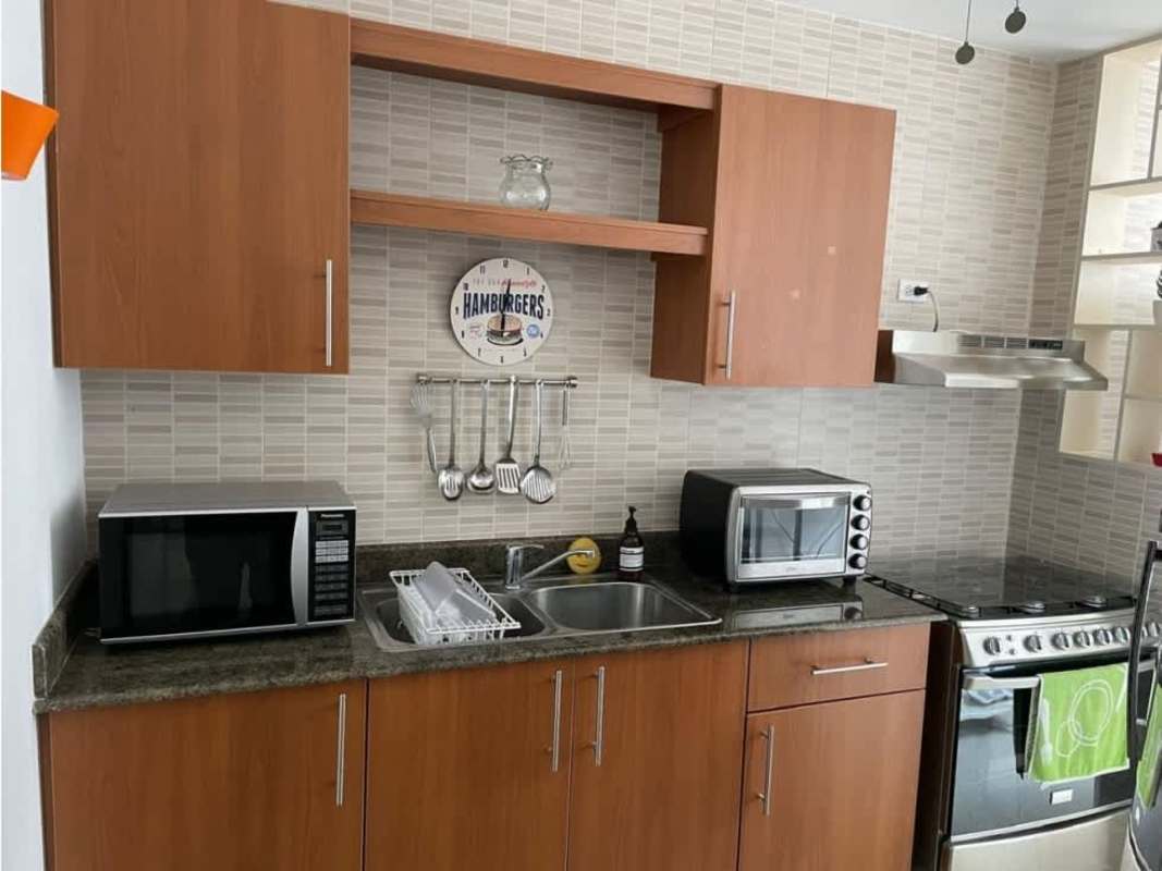 Modern dining area with furniture and decorative art in PH San Francisco Bay apartment Panama