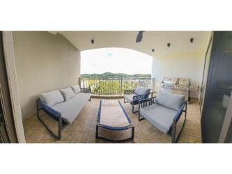 Private terrace overlooking green gardens in PH Explora Panama Pacifico