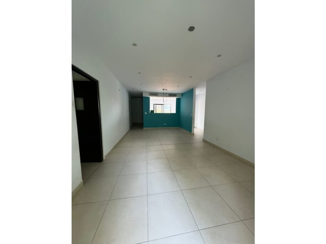 Tile floored living dining area with accent wall in PH Embassy Village Panama