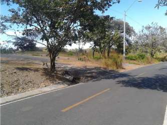 Asphalt paved road providing access to land for sale in El Nance San Carlos Panama