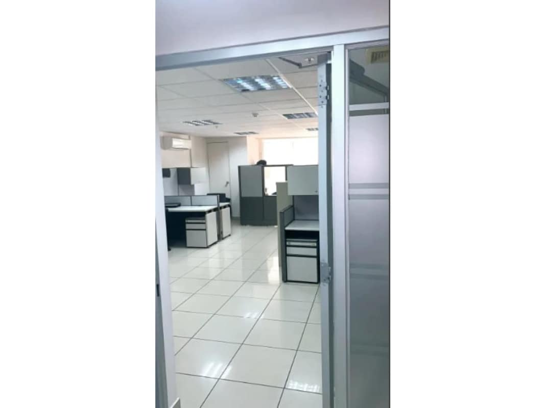 Lobby reception area at PH Mar del Sur with tiled floor and arch design in Bella Vista Panama