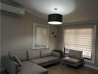 Bathroom with walk-in shower, vanity, tiles in Villa de las Fuentes Panama rental house