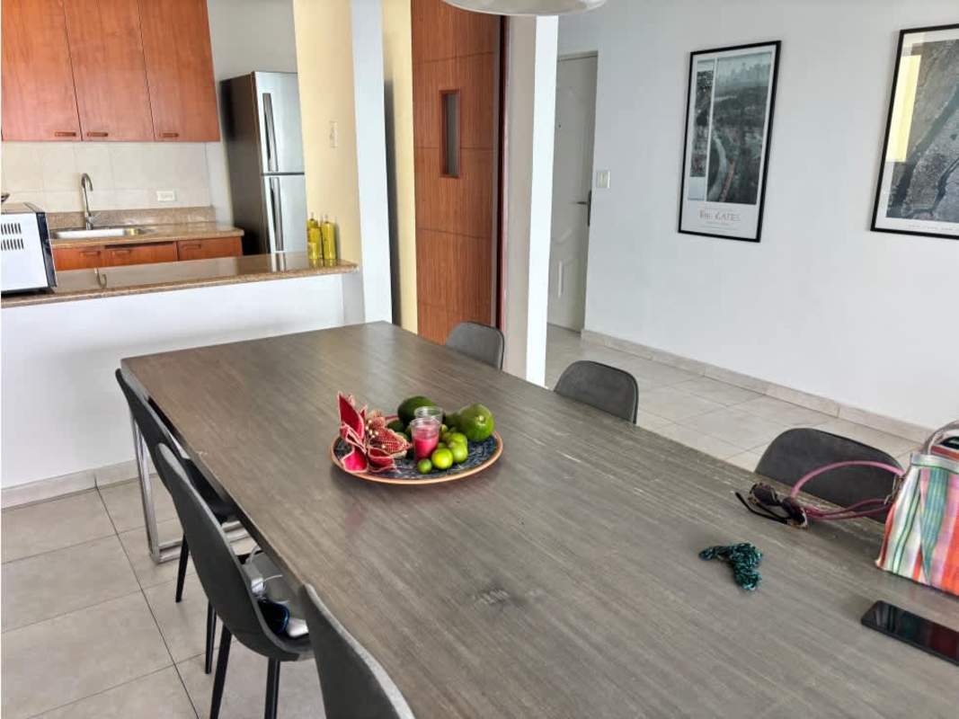 Bright open living room with floor-to-ceiling windows and ocean view balcony PH Terrawind Panama City