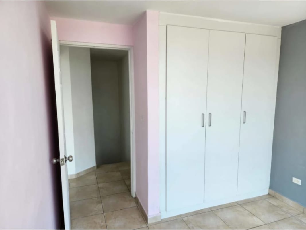 Bedroom with built-in wardrobe, tiled floor in PH Torres del Crisol II El Crisol Panama City