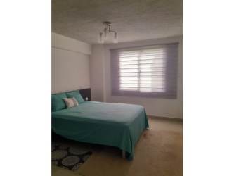 Furnished master bedroom with ocean views at Vista Mar Golf & Beach Resort Panama