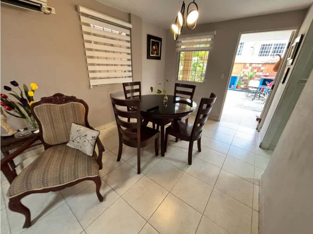 Furnished master bedroom with AC, built-in closet, window light at Dorado Lake Condado del Rey rental house