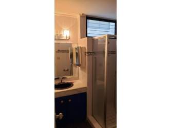 Bedroom, built-in closet, window with urban view, ceiling fan, PH Toledo Panama City