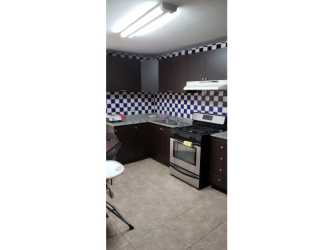 Kitchen cabinets appliances and tile walls Edificio Toledo Punta Paitilla rental
