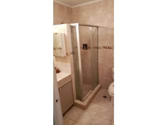 Bathroom with glass shower enclosure, vanity Edificio Toledo Panama rental