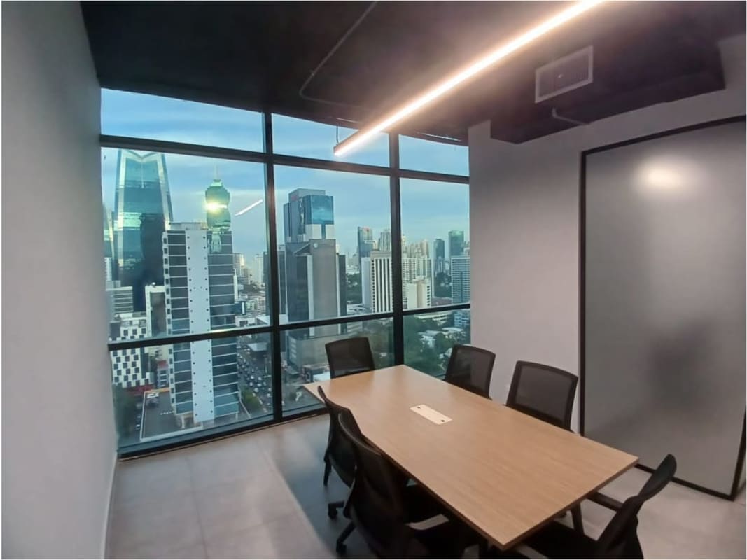 Modern furnished open-plan office area with glass partitions in PH Financial Center Towerbank
