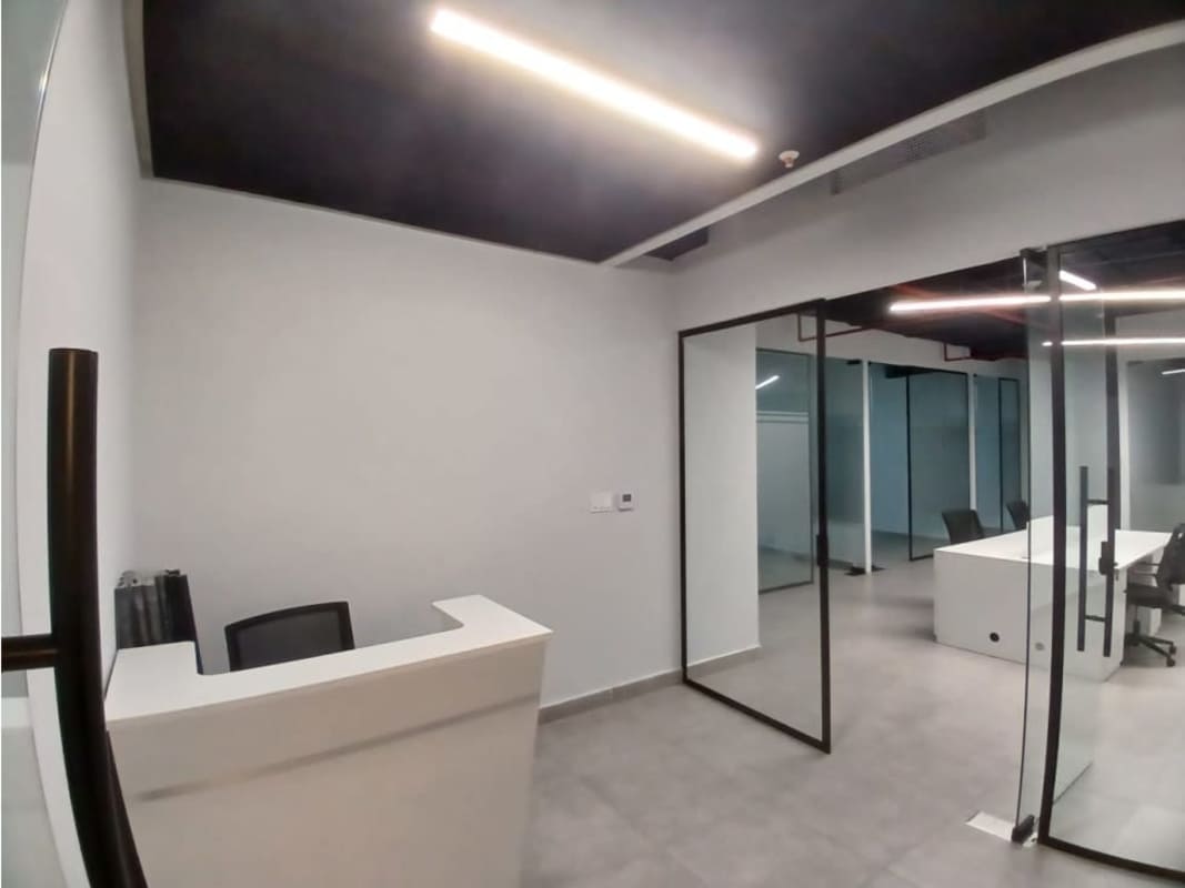 Designer commercial office bathroom with modern tiles and vanity in Towerbank PH Financial Center