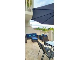 Fully equipped kitchen island open plan in luxury Buenaventura Marina Village apartment rental