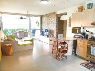 Private outdoor patio with barbecue and dining space at Punta Barco Panama