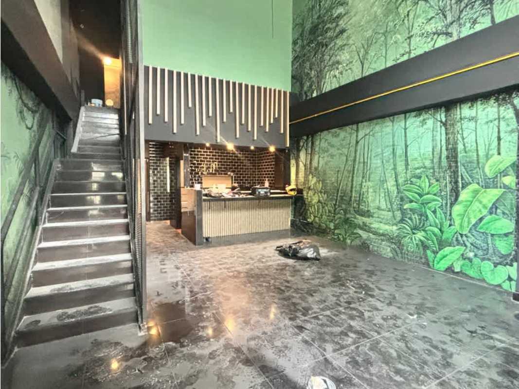 Tiled bathroom with ceramic sink and mirror at Plaza 74 San Francisco commercial space