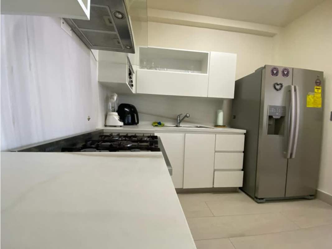 Remodeled kitchen with stainless steel appliances and modern cabinets at PH The Cosmopolitan Panama