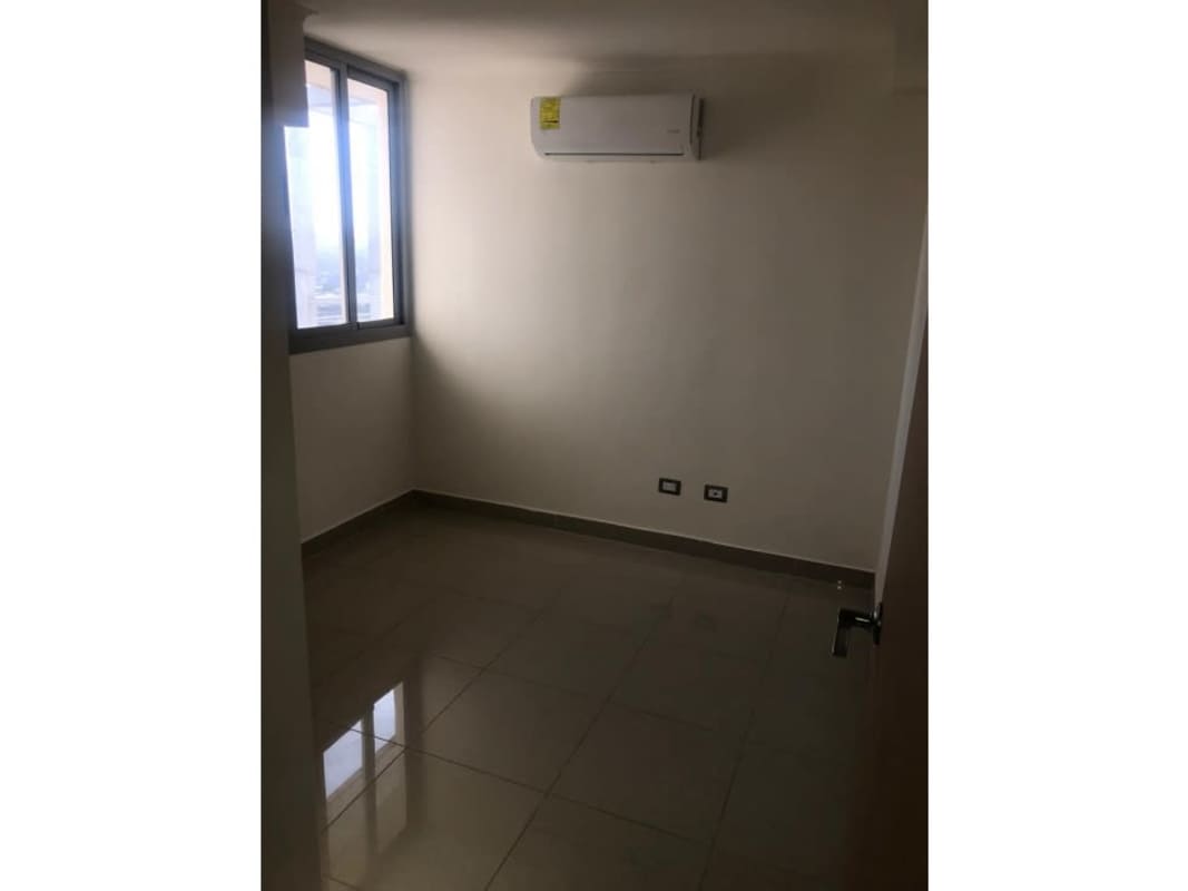 Bright bedroom in PH Rokas with large window and tiled flooring, Condado del Rey Panama