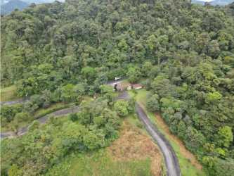 Winding mountain community roads amid forested land at Altos del María Panama