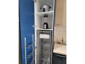 Kitchen island with pendant lights and bar stools PH Roca Marina beach condo Panama