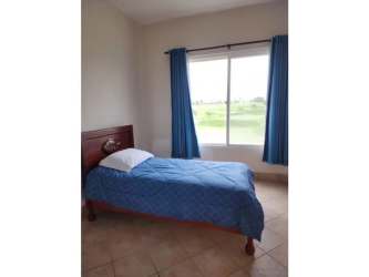 Minimalist bedroom with AC tile flooring and natural light PH Roca Marina San Carlos