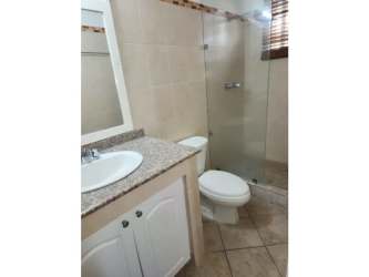 Contemporary bathroom granite countertop glass door Vista Mar condo Panama