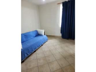 Bathroom with granite countertop and glass enclosed shower in PH Roca Marina San Carlos Panama