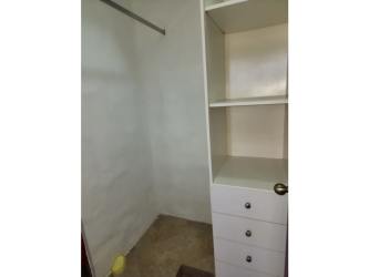 Bedroom with blue curtains and natural light Vista Mar Roca Marina Panama