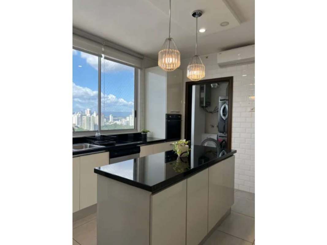 Sleek kitchen with granite countertops and stainless steel appliances PH Jade Tower San Francisco Panama