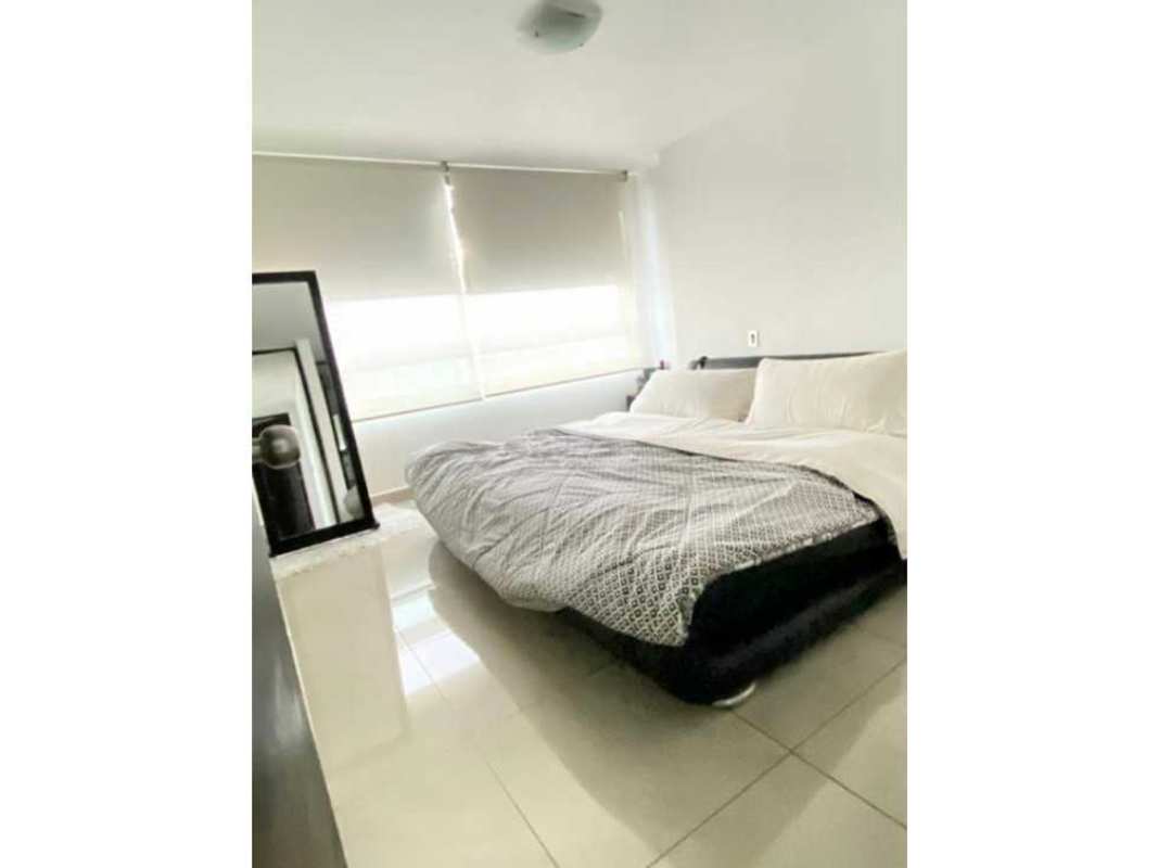 Bright bedroom with large windows and built-in closet in PH Terrwind Panama City