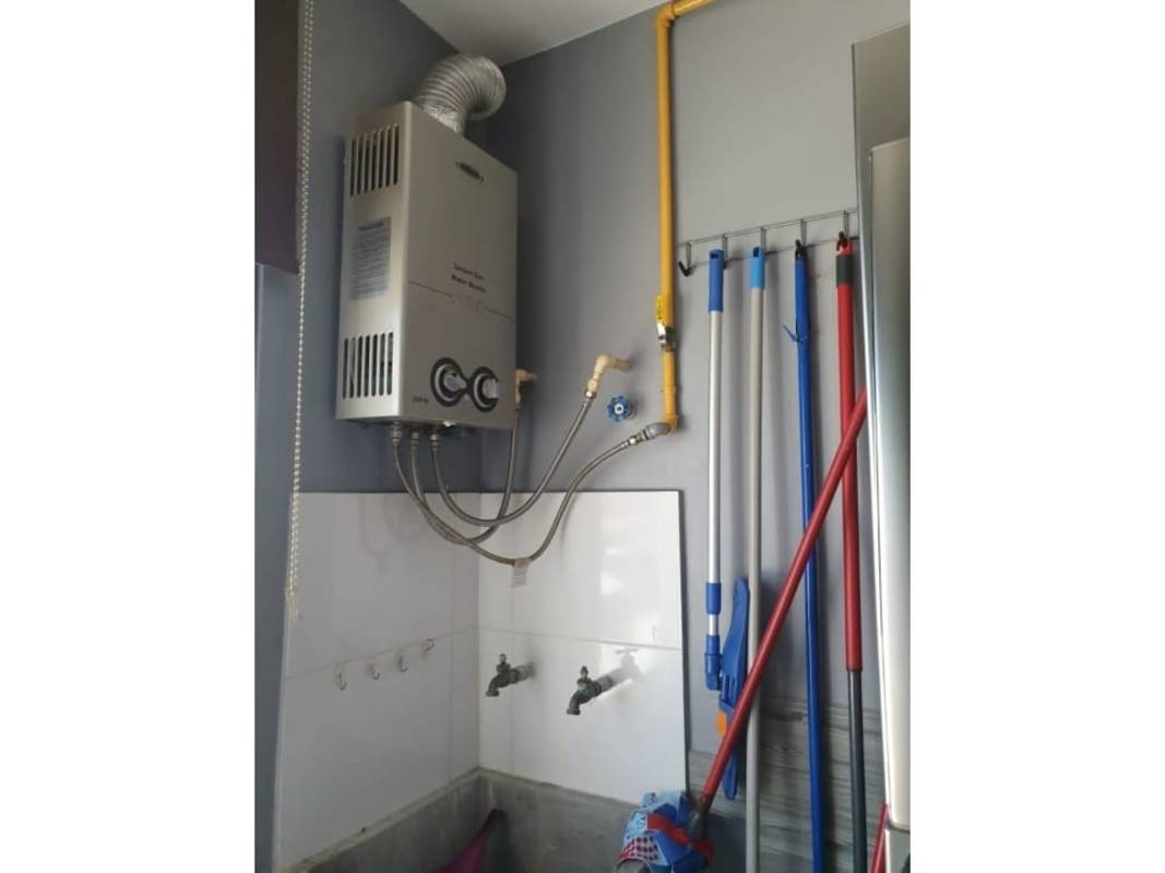 Cityscape view through window and balcony PH Lefevre 75 Parque Lefevre apartment Panama