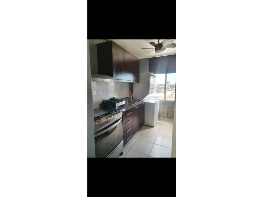 Bathroom with glass shower, tile walls and vanity sink at PH Lefevre 75 Parque Lefevre Panama
