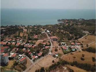 Clubhouse area with swimming pool, lounge chairs Punta Barco Village gated beach community