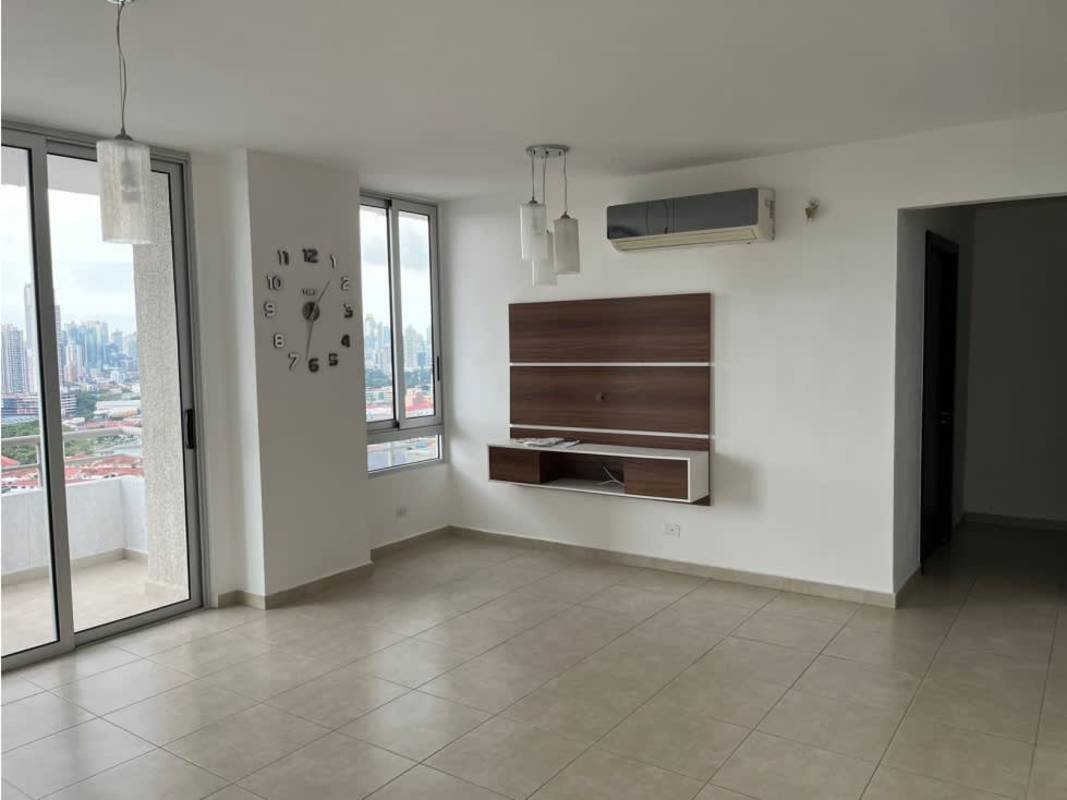 Spacious living room with large windows, balcony door, and panoramic city view PH Macedonia Tower Panama