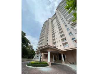 Contemporary kitchen with granite countertops, island, stainless appliances at PH Las Olas II Vistamar Panama
