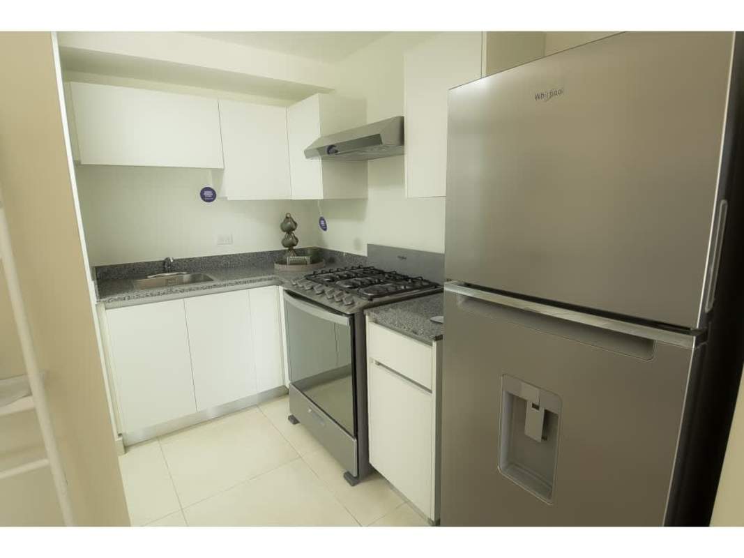 Contemporary living area with large window, open plan design Panama Viejo Residences Panama