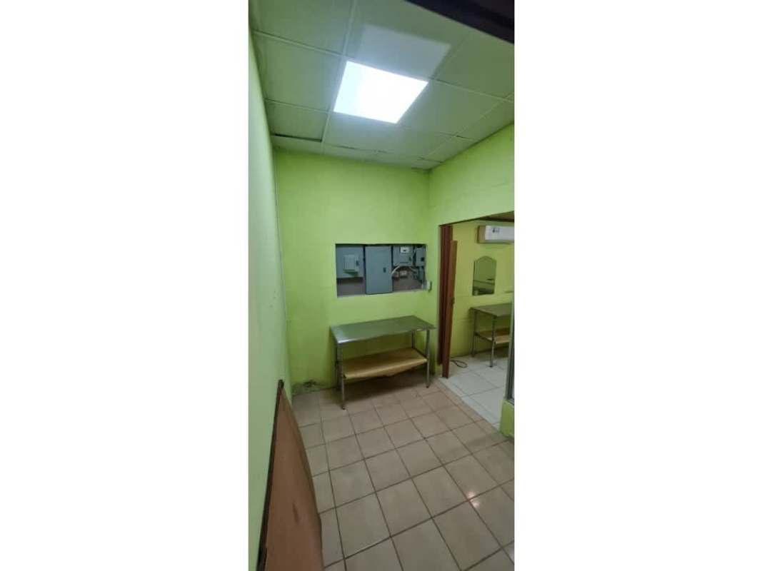 Small tiled workspace or utility room inside commercial property Betania Panama