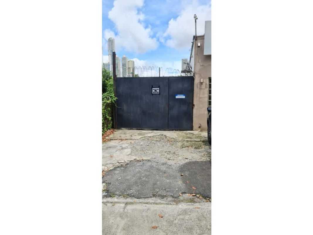 Secure metal gate and access alley commercial building La Alameda Panama