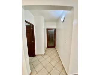 Open bright living space with tiled floor ceiling fans Albrook Panama