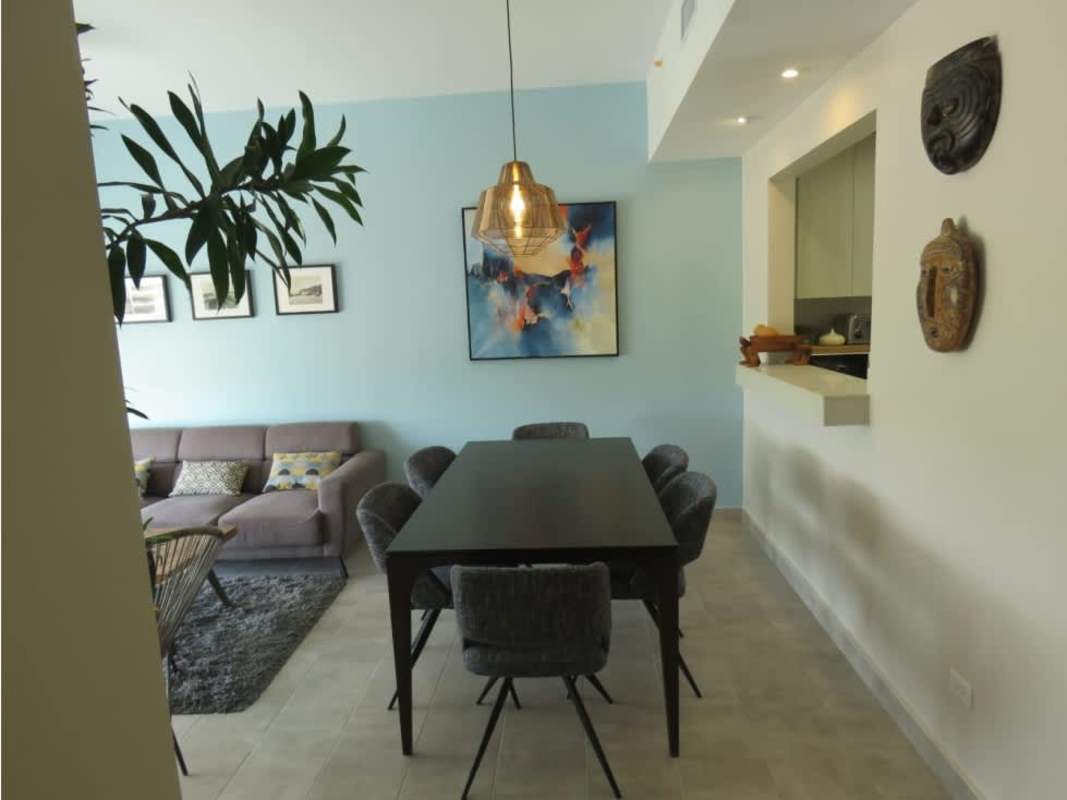 Furnished master bedroom with window golf view at Tucan Golf Resort Panama