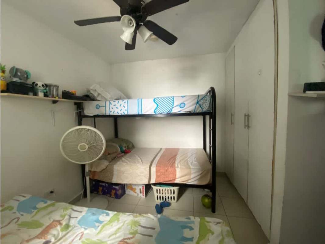 Bedroom with built-in closet, ceiling fan in PH Riverside Parque Lefevre Panama City