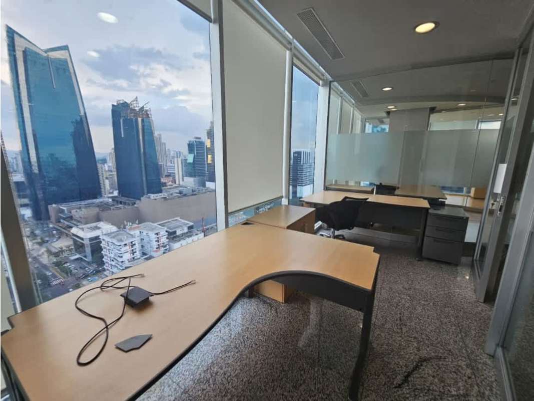 Glass enclosed office with panoramic skyline view Torre Global Bank Panama City