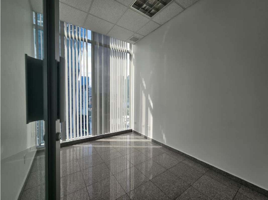 Private enclosed office room with large window and vertical blinds in Torre Global Bank Panama